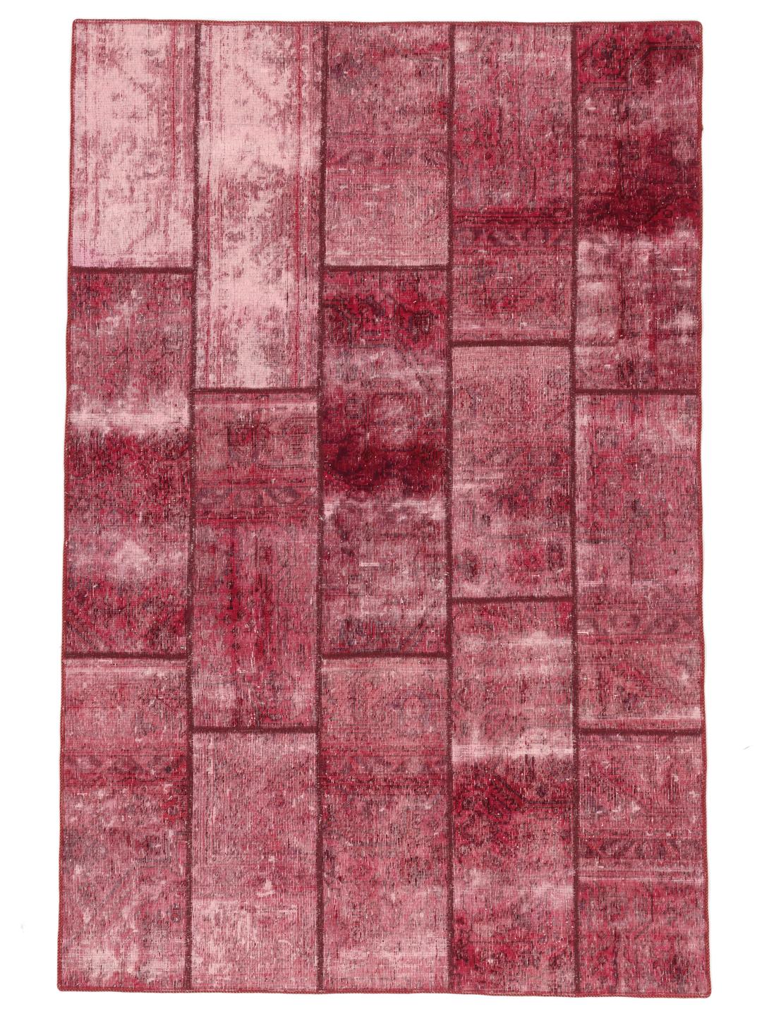 Hand-knotted patchwork rug from the Middle East in vibrant shades of red