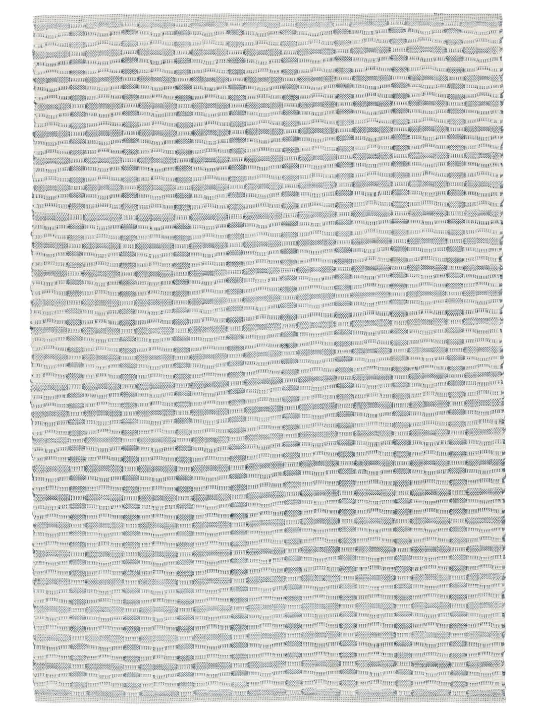 Tapis bleu et blanc avec une texture tissée