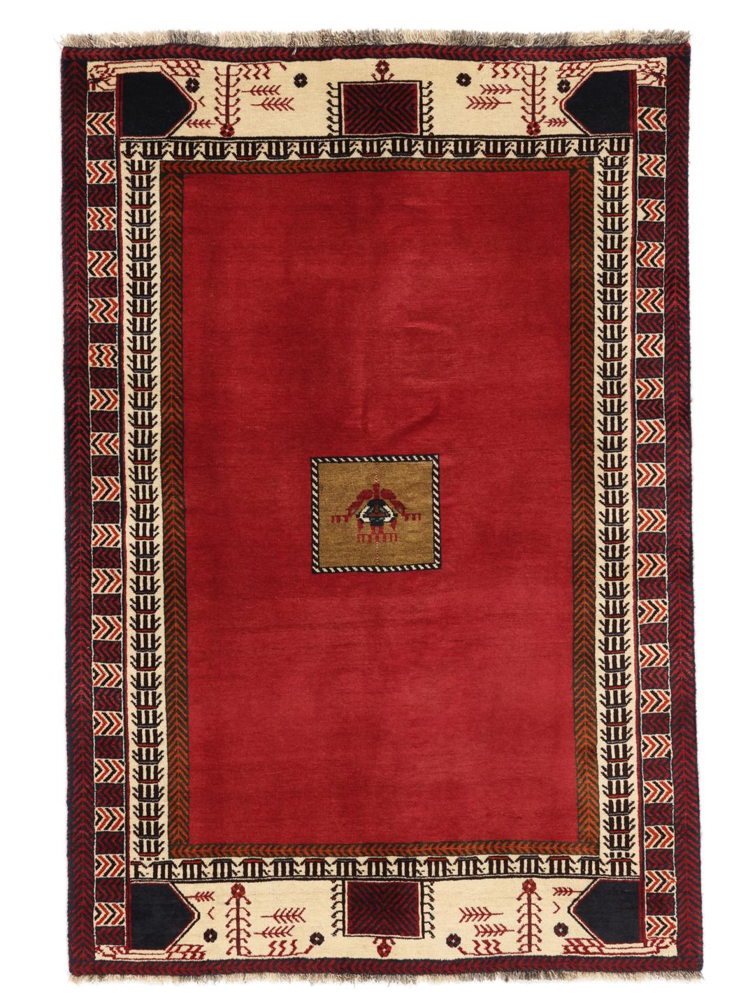 Hand-knotted Qashqai rug from the Middle East in vibrant red with geometric motifs