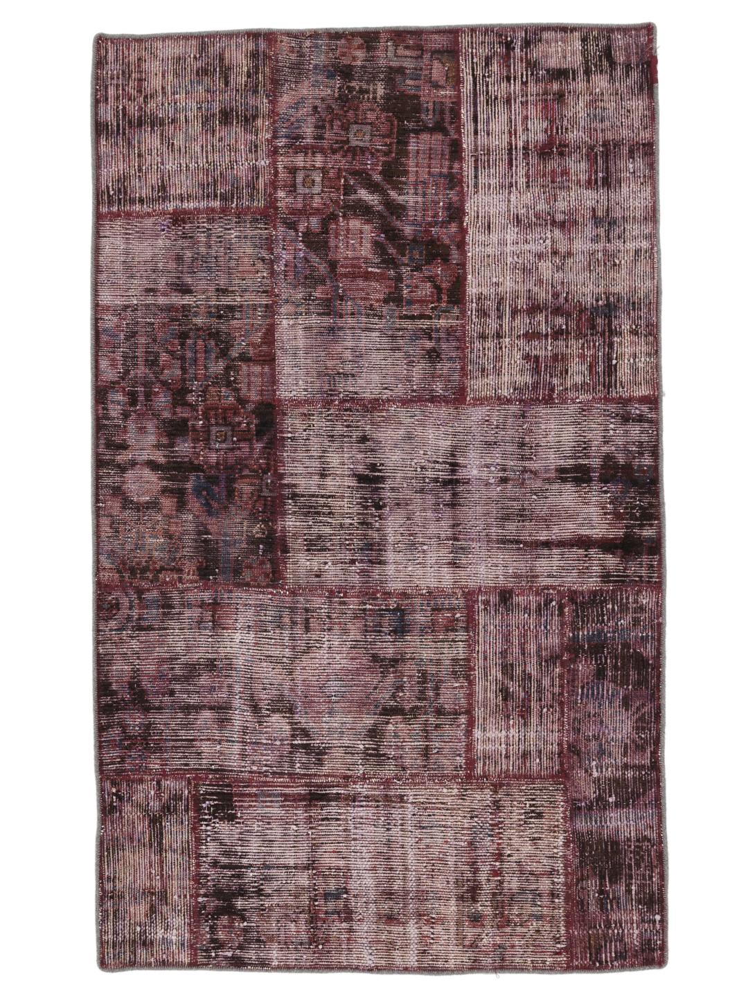 Handgemaakt patchwork tapijt uit het Midden-Oosten in donkerrood