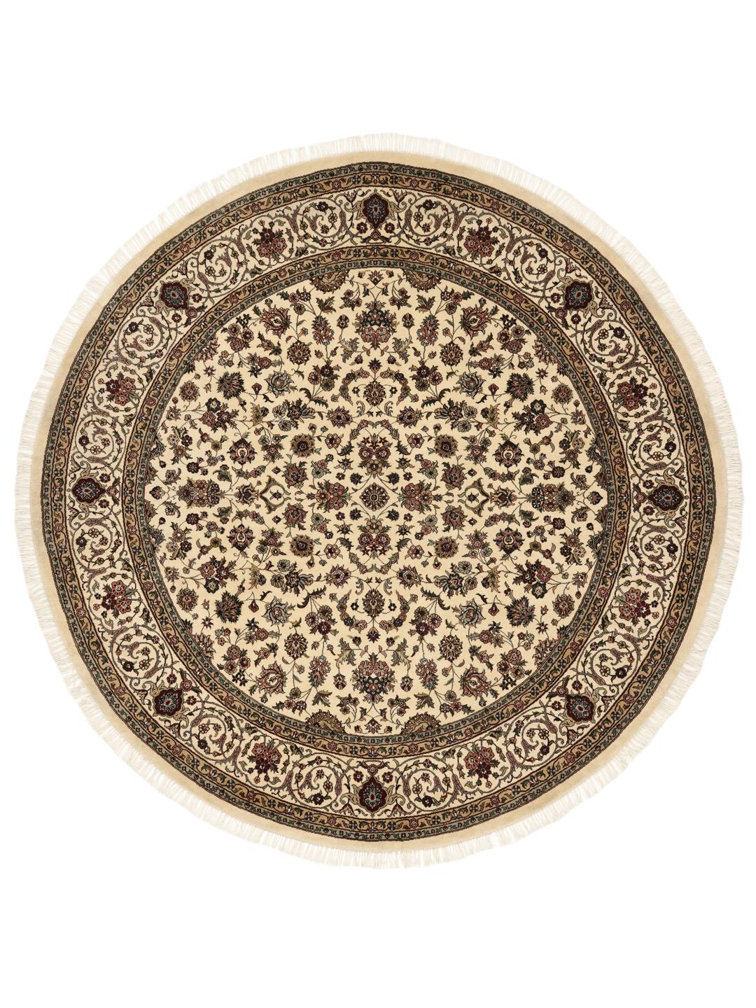 Tapis Sarough rond avec motif floral, noué à la main en Inde dans des tons beige.