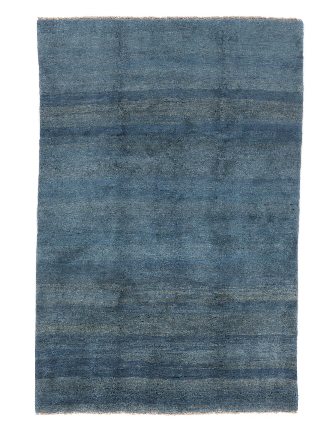 Handgeknoopt blauw wollen vloerkleed uit het Midden-Oosten met een zachte, dichte pool.