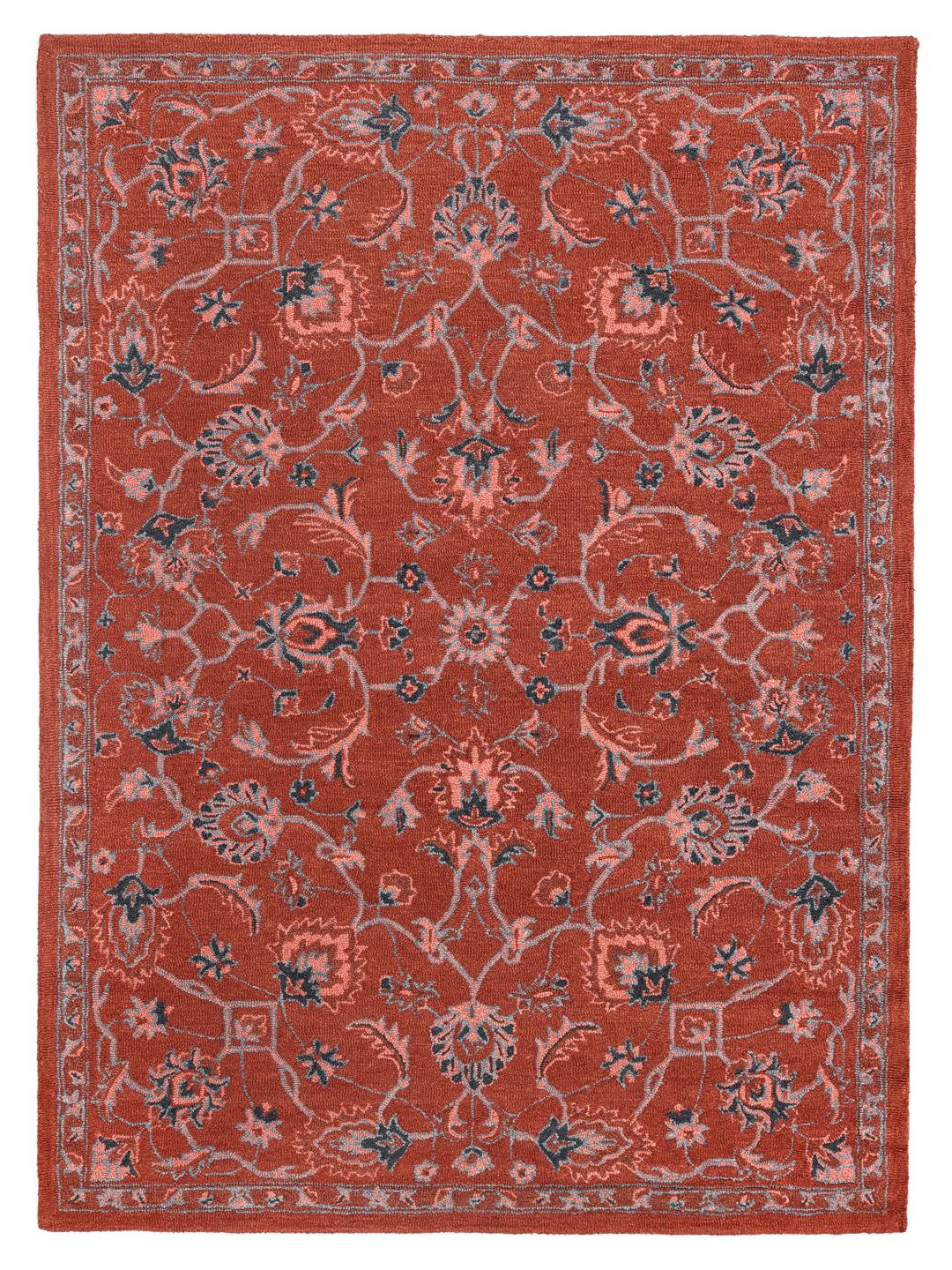 Rood en blauw wollen tapijt met een bloemenpatroon