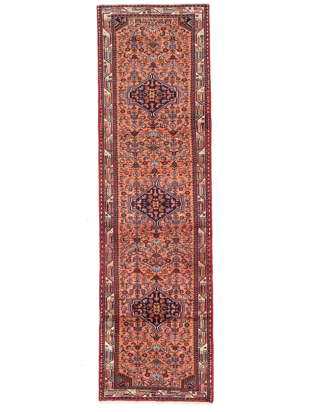 Hand-knotted Middle Eastern runner in red with geometric medallions
