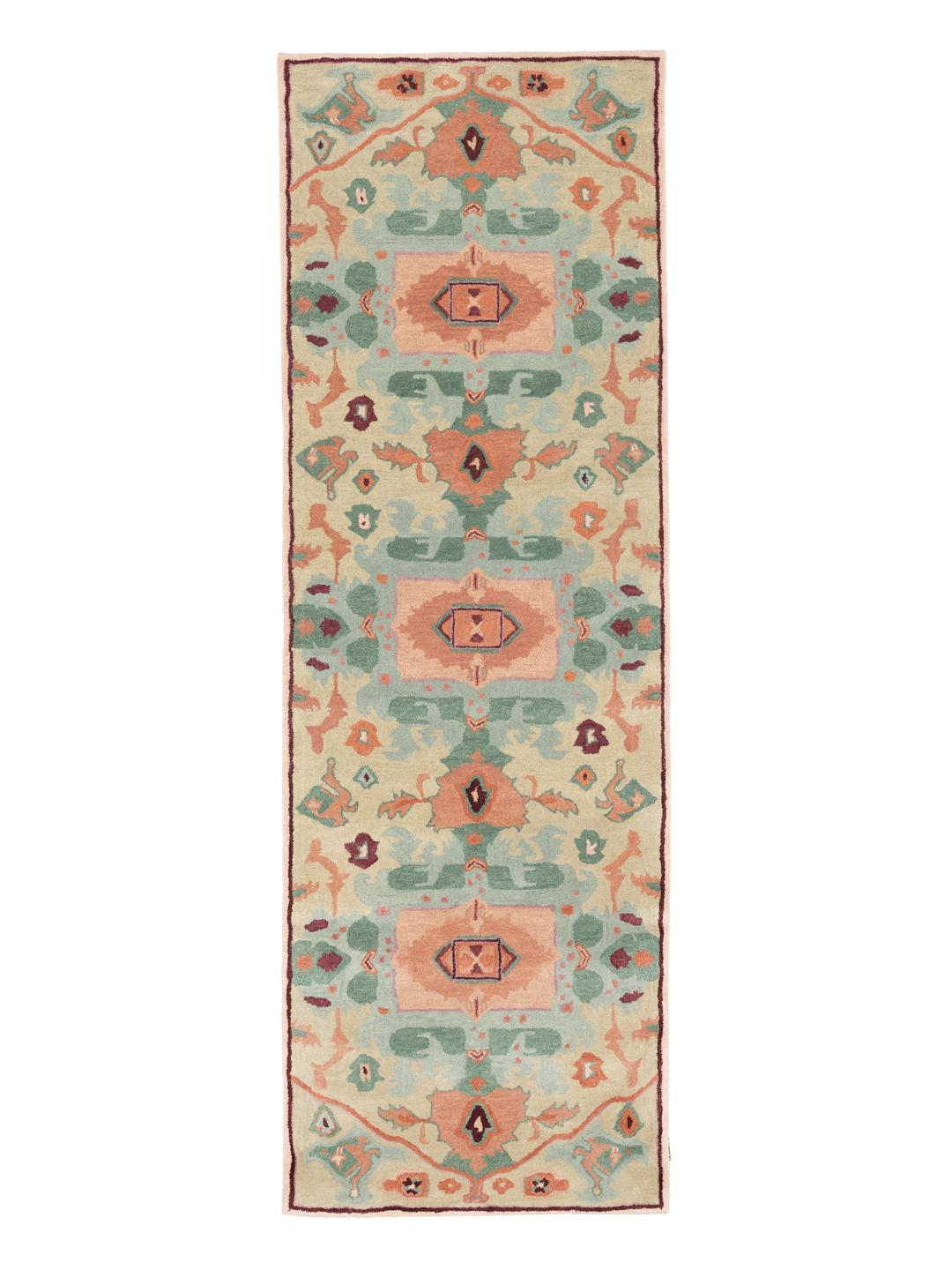 Håndtuftet løber med et farverigt mønstret design i beige og multifarvede toner
