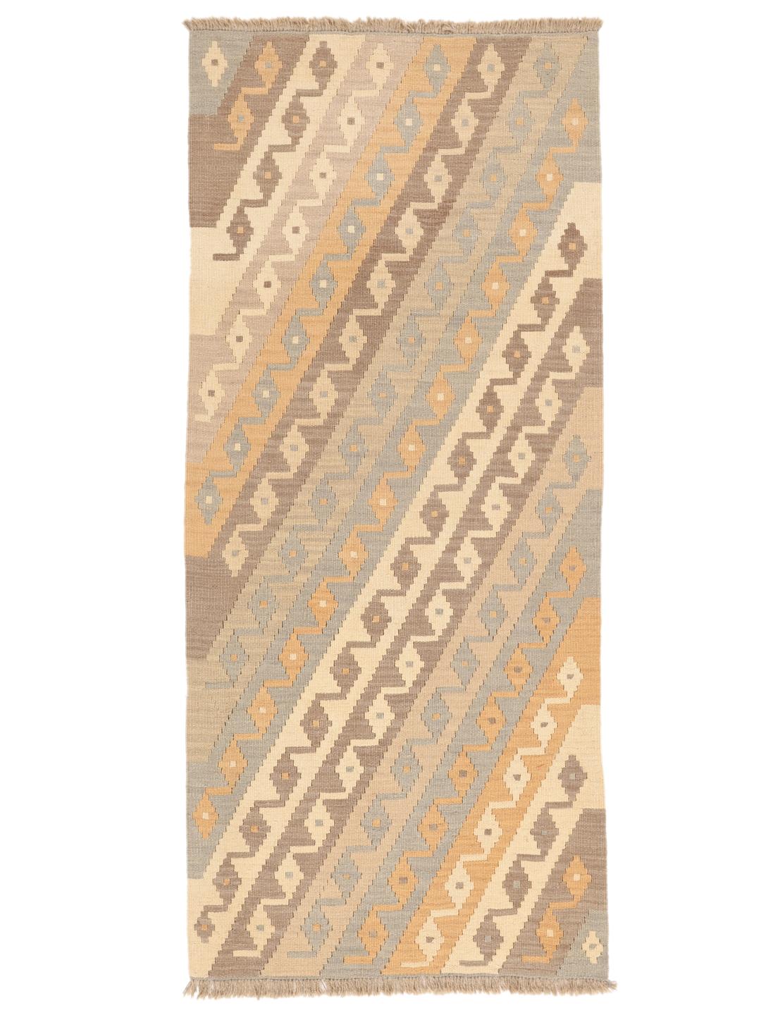 Runner Kilim tessuto a mano con motivi geometrici in tonalità terrose dal Medio Oriente