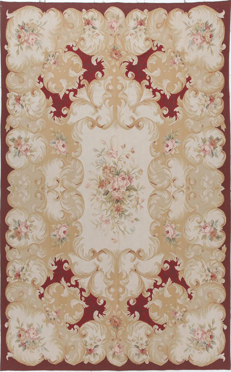 Håndvævet tæppe i Aubusson-stil med blomstermønster i røde og beige nuancer fra Kina