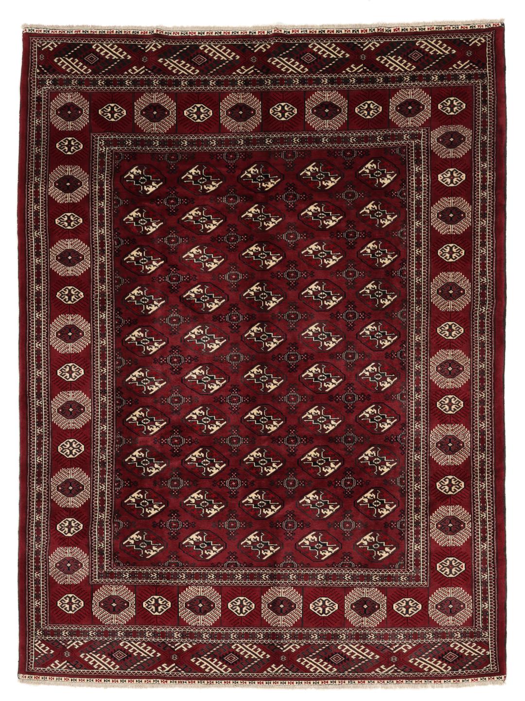 A hand-knotted Middle Eastern Turkman rug featuring deep red tones and geometric patterns.