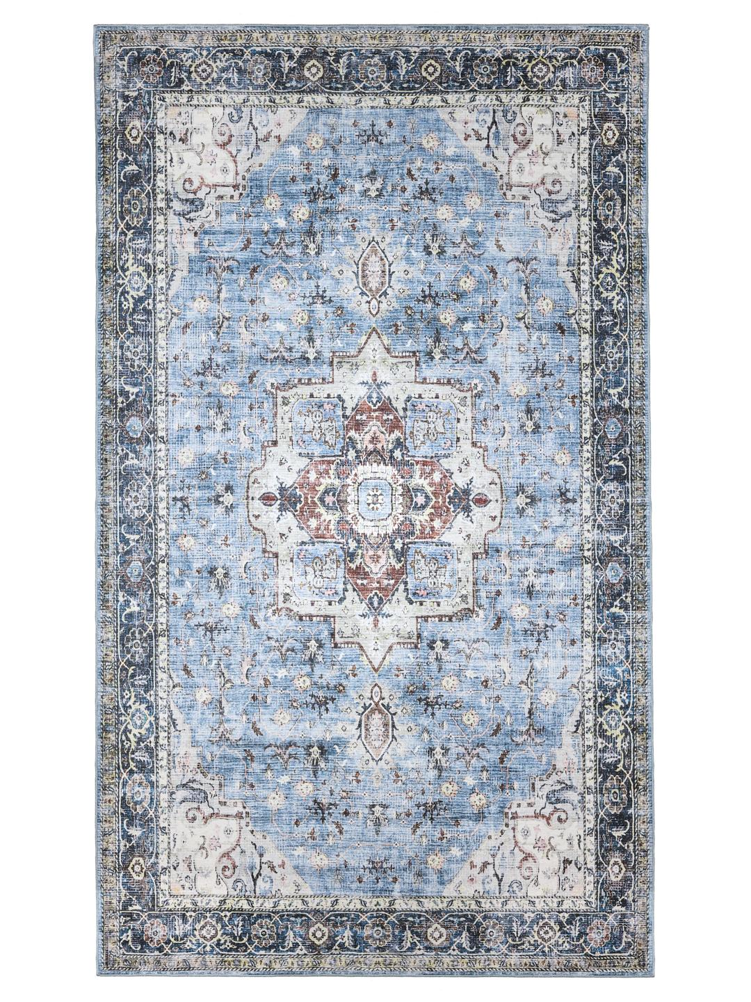 Blauw tapijt met traditionele motieven en een gedetailleerde rand