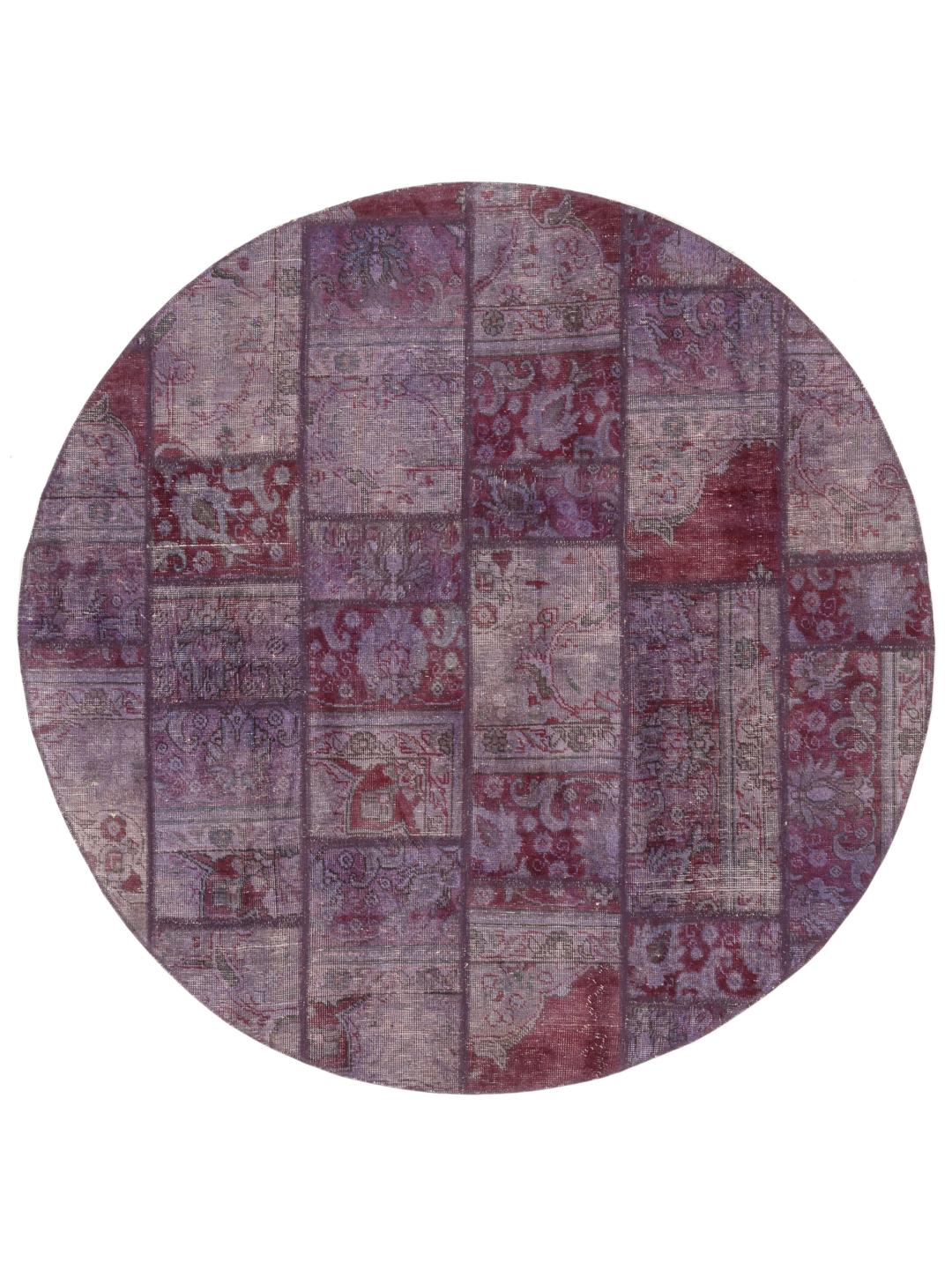 Rundt patchwork-tæppe fra Mellemøsten i mørklilla toner