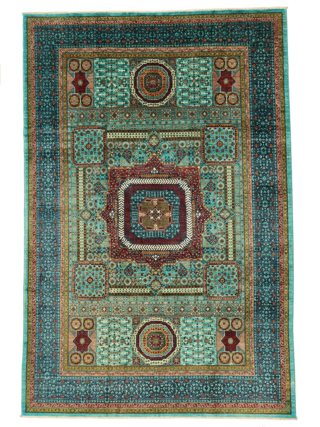 Et håndknyttet Mamluk-tæppe fra Afghanistan med dybblå og røde geometriske motiver.