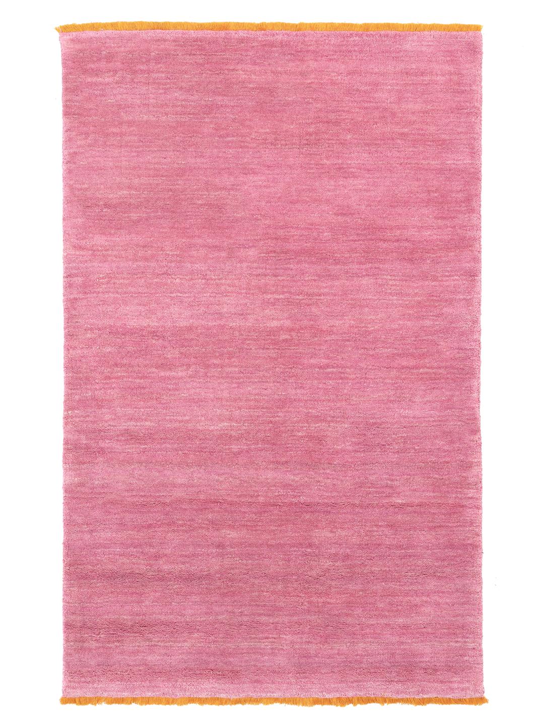 A pink and orange Wool rug with a soft texture.