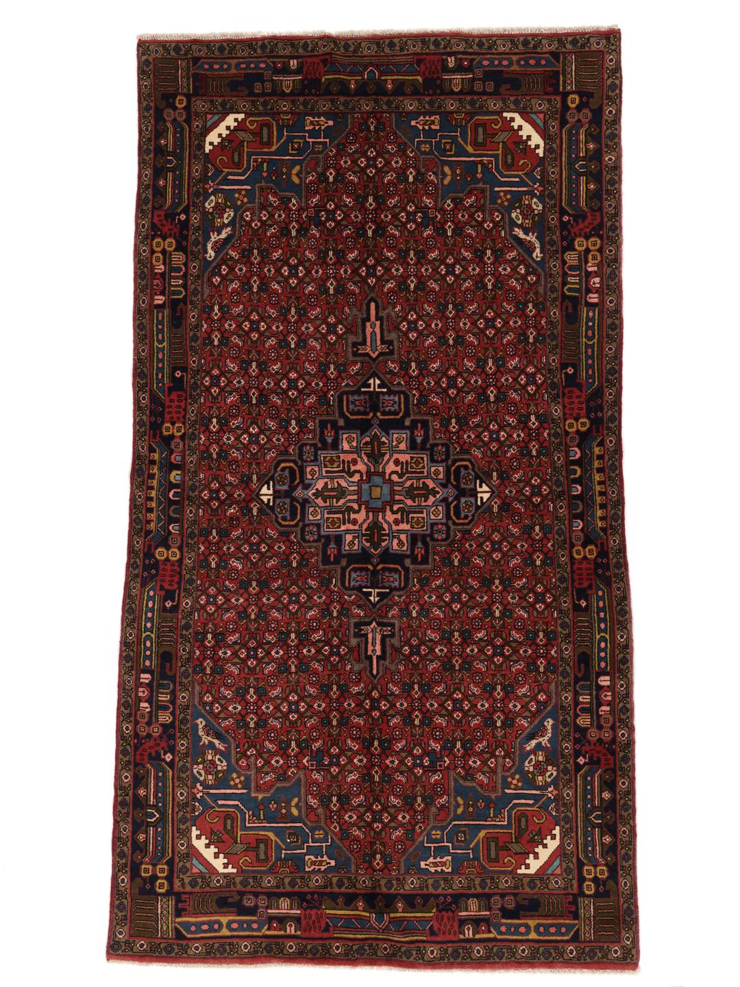 Hand-knotted Hosseinabad rug with a central medallion in red and blue tones