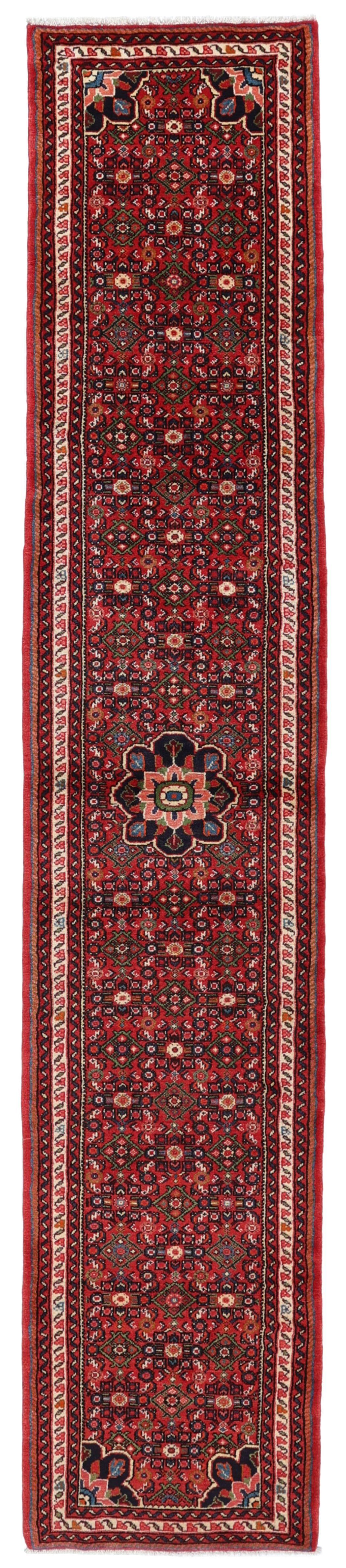 Handmade Hosseinabad runner from the Middle East featuring a vibrant red field