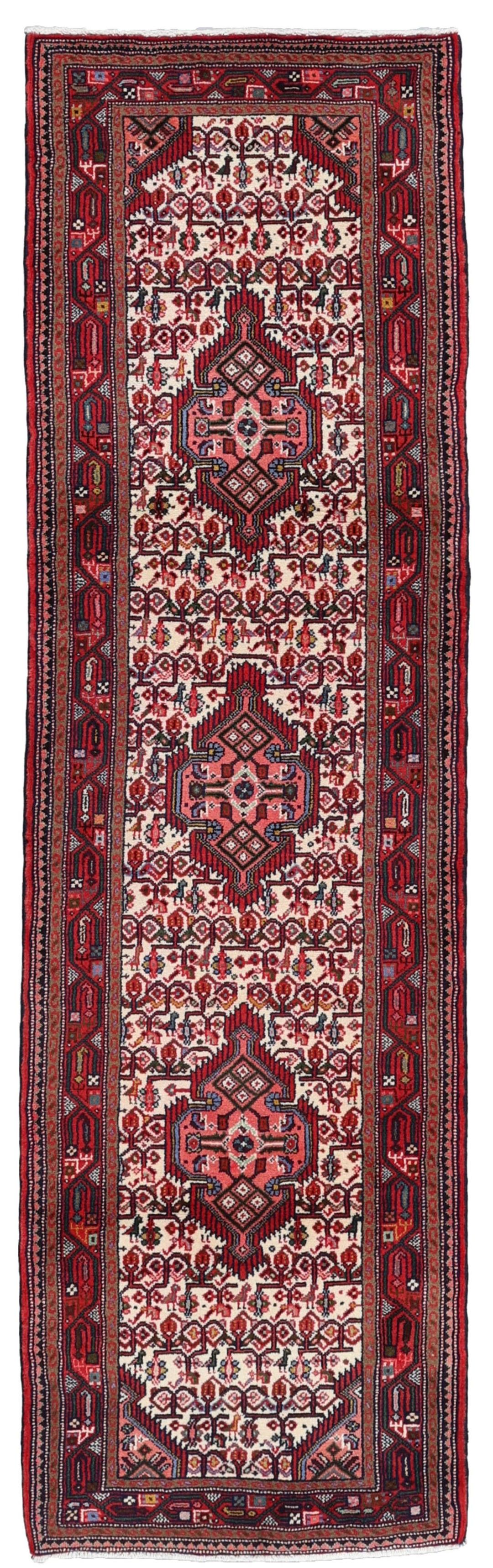 Hand-knotted runner from the Middle East in a deep red and beige palette