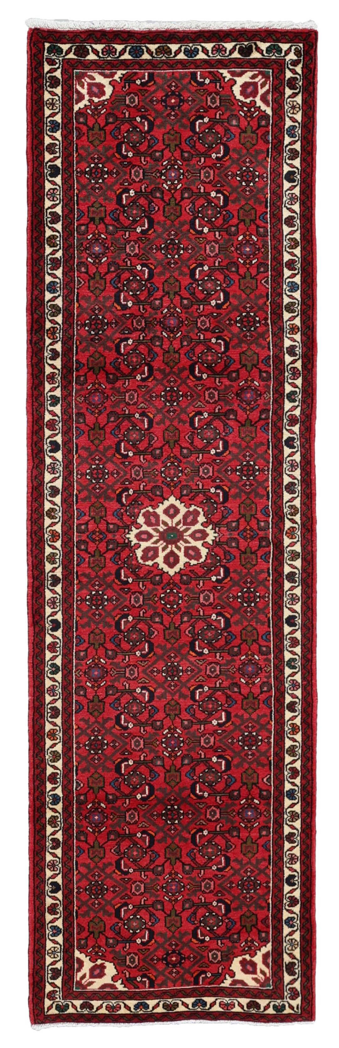 Handgeknoopte Hosseinabad loper in rood met geometrische tribale motieven