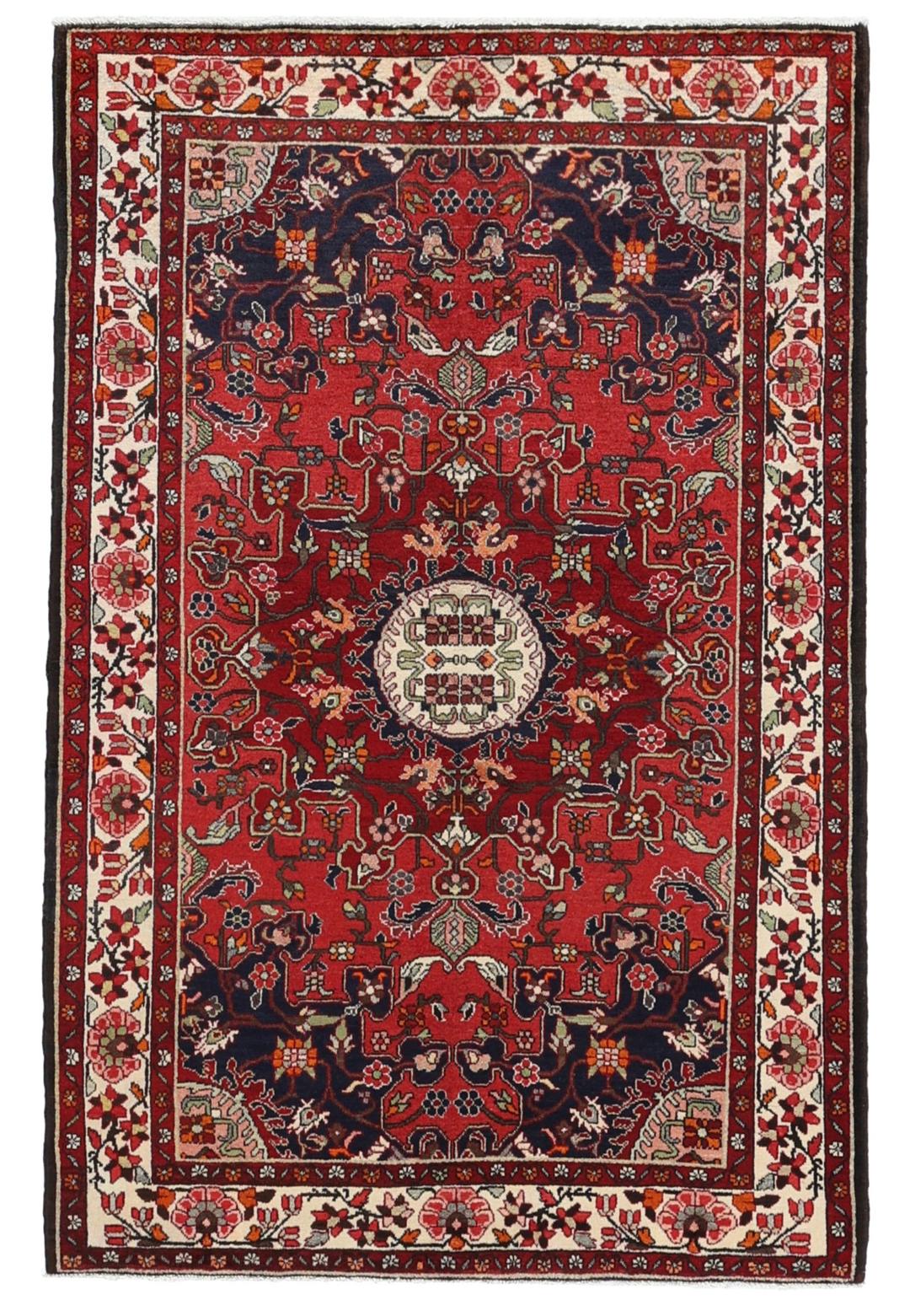 Hand-knotted Tafresch Wool rug from the Middle East featuring a red and blue floral design