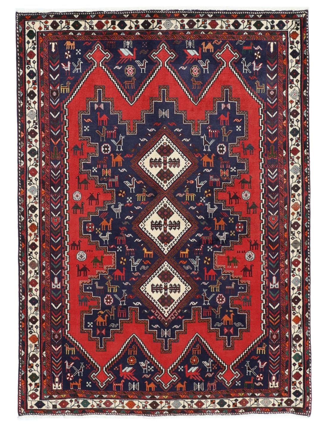 Hand-knotted Afshar rug from the Middle East featuring a red and blue tribal design.