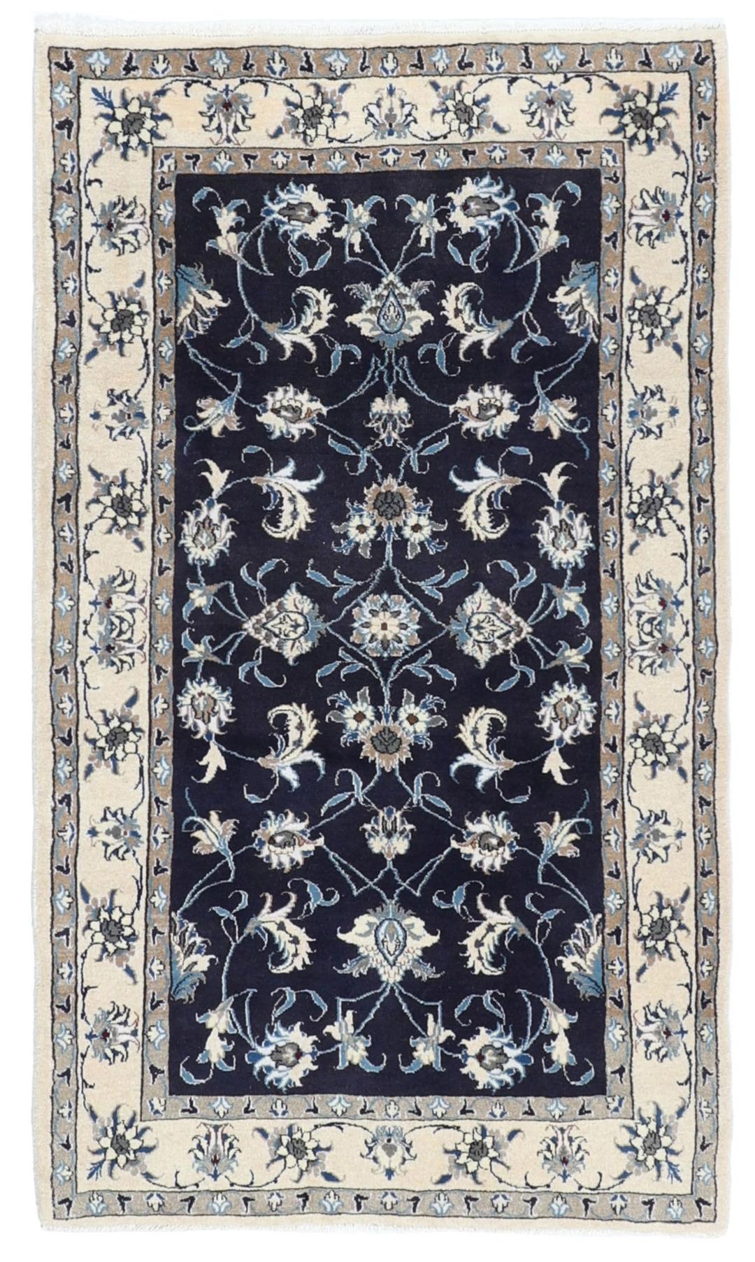 Hand-knotted Nain rug from the Middle East in dark blue and beige tones.