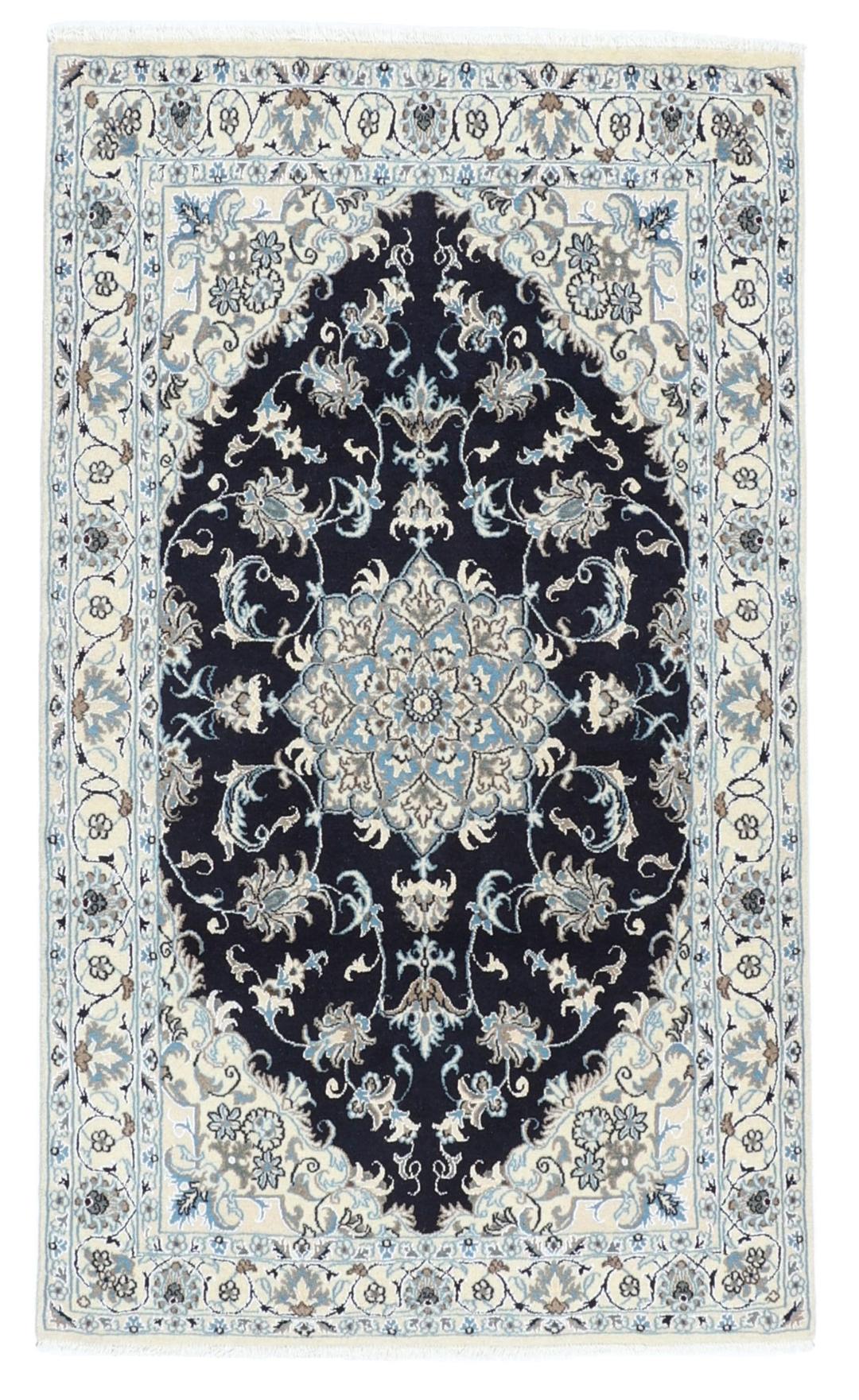 A sophisticated hand-knotted Nain rug from the Middle East with a dark-blue and beige floral pattern.