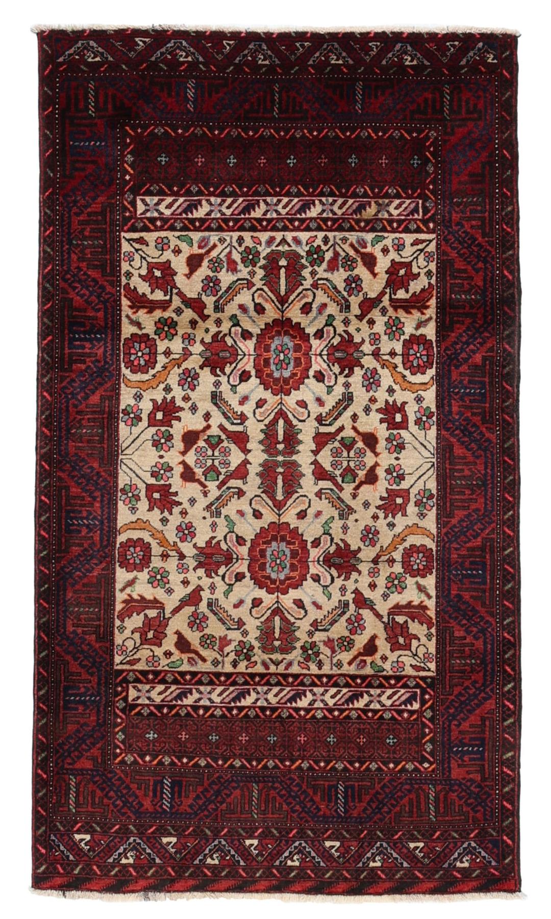 A hand-knotted Baluch rug from the Middle East featuring red and beige floral patterns.