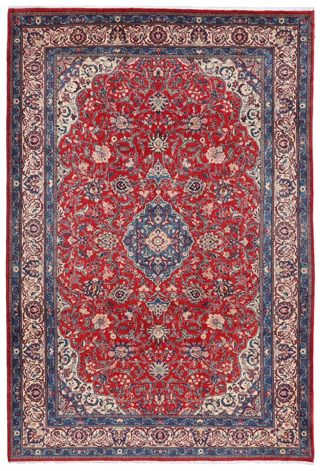 Een handgeknoopt Mahal-vloerkleed uit het Midden-Oosten met een levendig rood en blauw bloemenpatroon.
