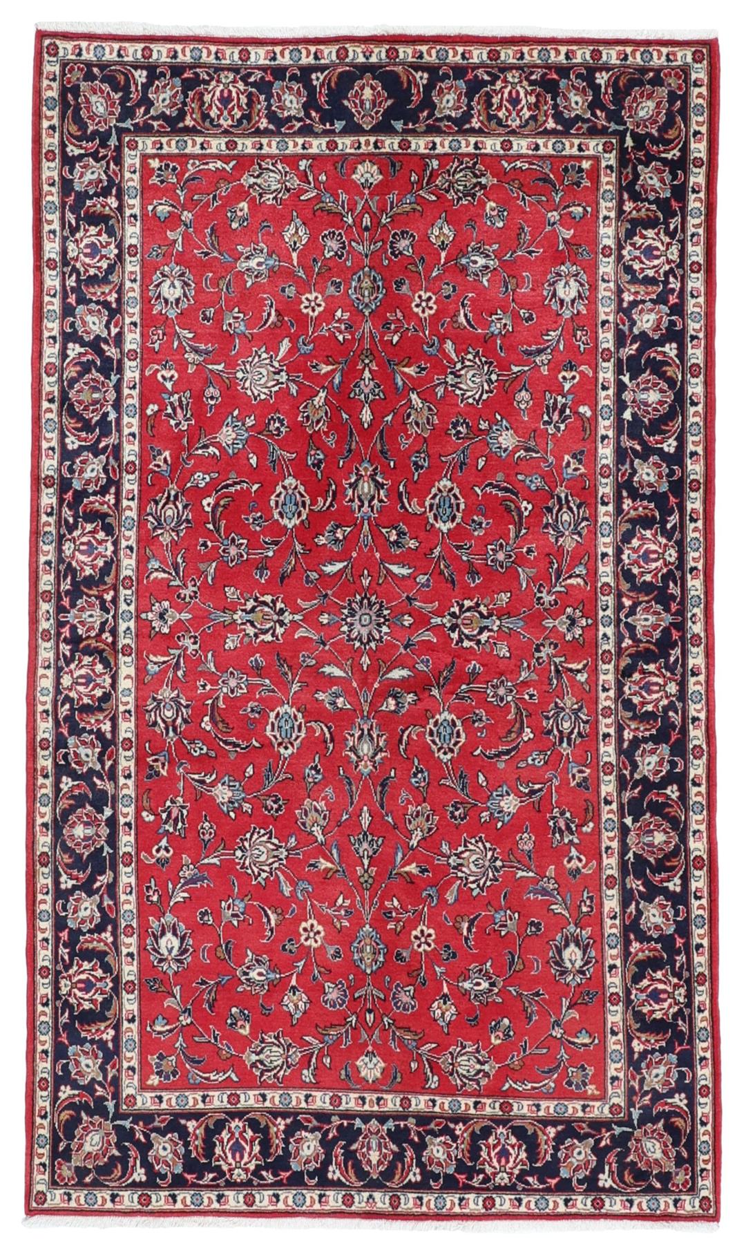 Hand-knotted Keshan rug from the Middle East featuring a vibrant red field with intricate floral patterns.