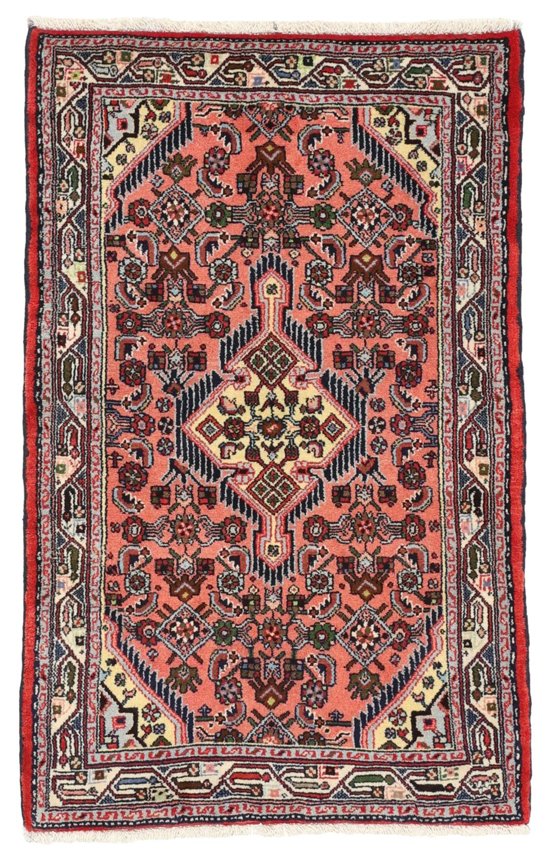 Hand knotted Asadabad rug from the Middle East in shades of red