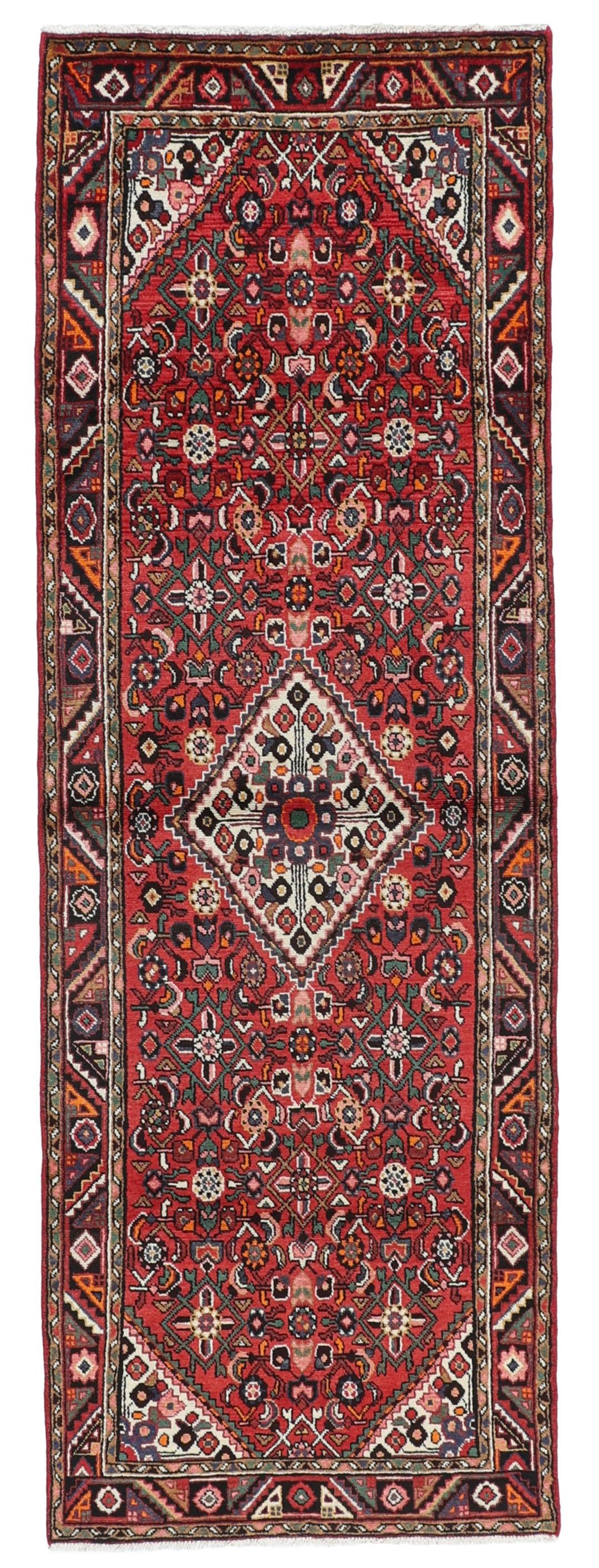 Handgeknoopte Hosseinabad loper met een levendig rood geometrisch patroon