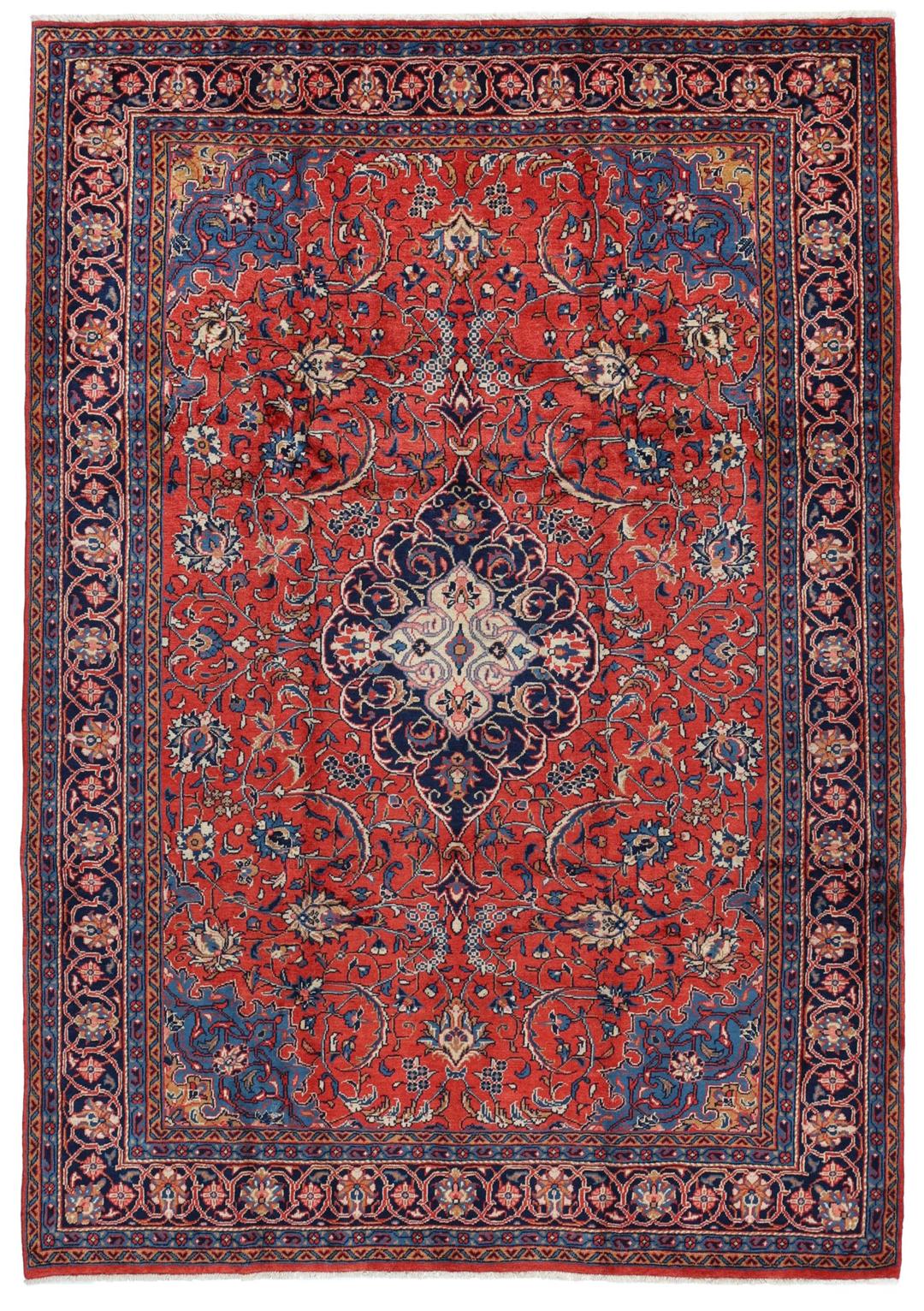 Met de hand geknoopt tapijt uit het Midden-Oosten met een centraal medaillon in rood en blauw.