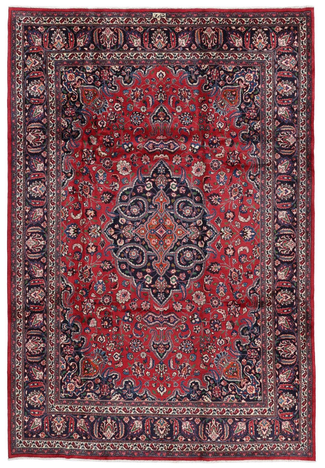 Hand-knotted Mashad rug from the Middle East in deep red and dark blue tones