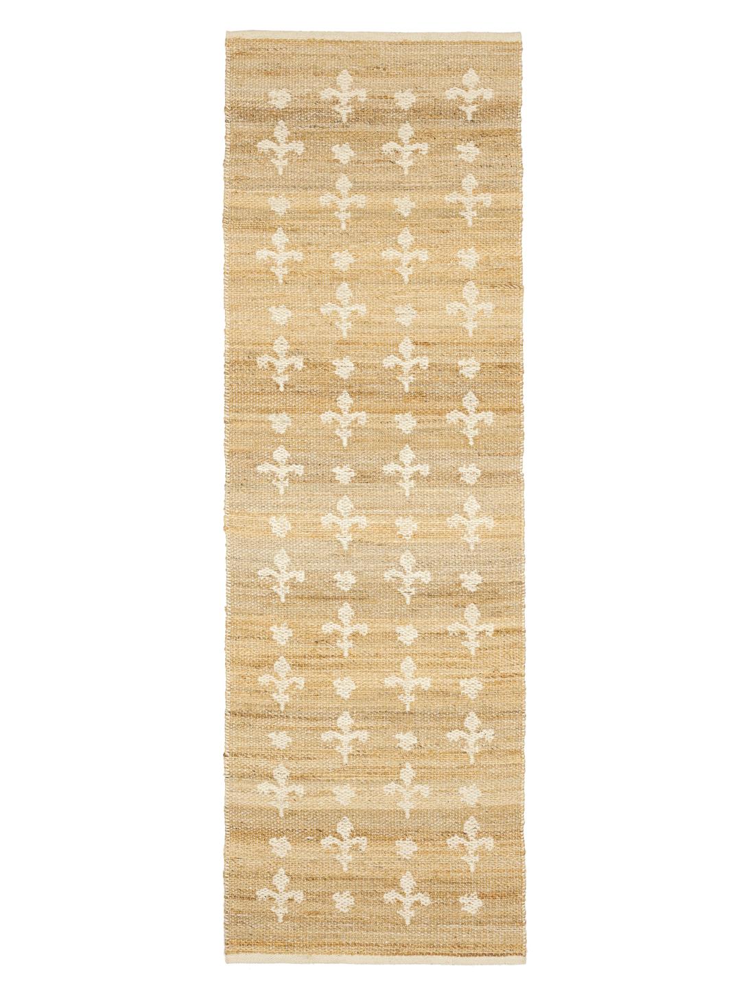 Beige og hvid løber med en tekstur af naturlige fibre