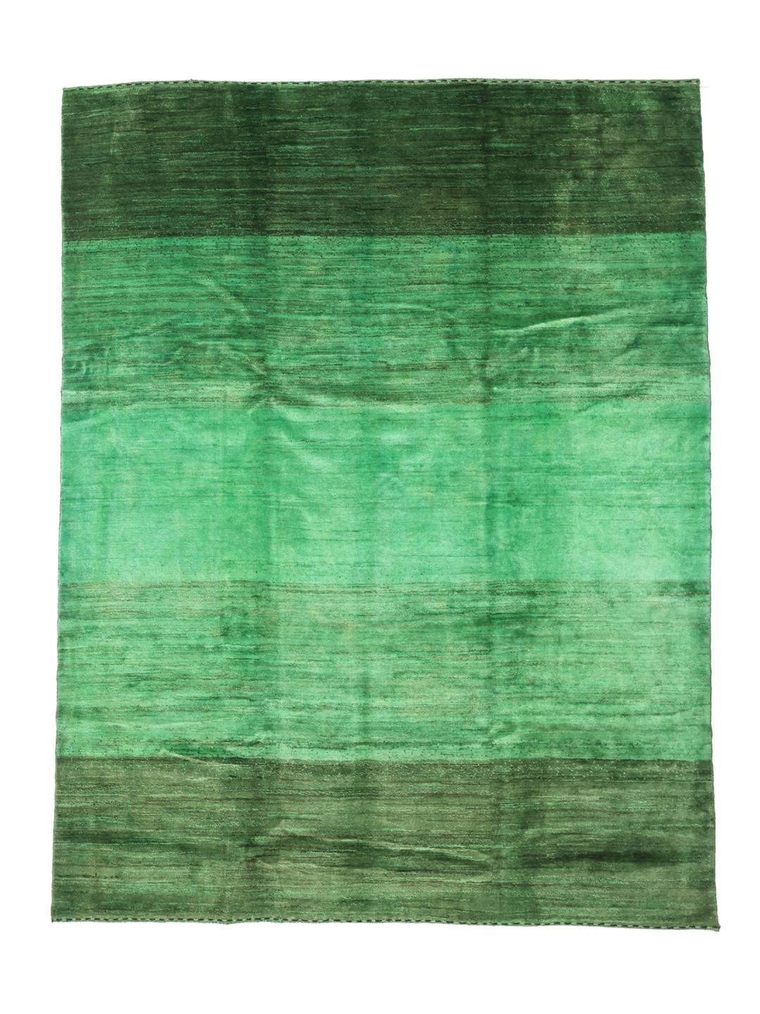 A hand-knotted green Gabbeh rug from the Middle East with a subtle ombre design.