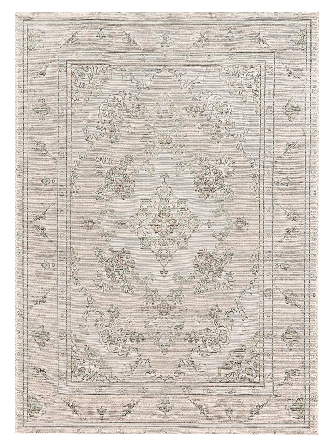 Beige tæppe med et traditionelt mønster