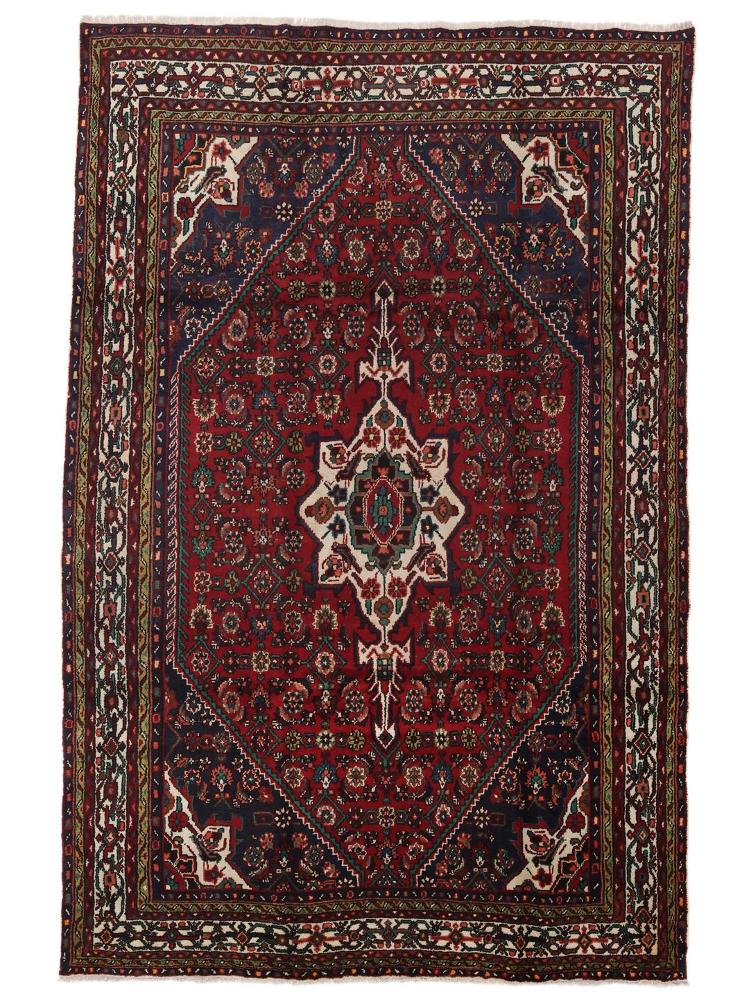 Hand-knotted Hosseinabad rug from the Middle East in deep red and blue tones