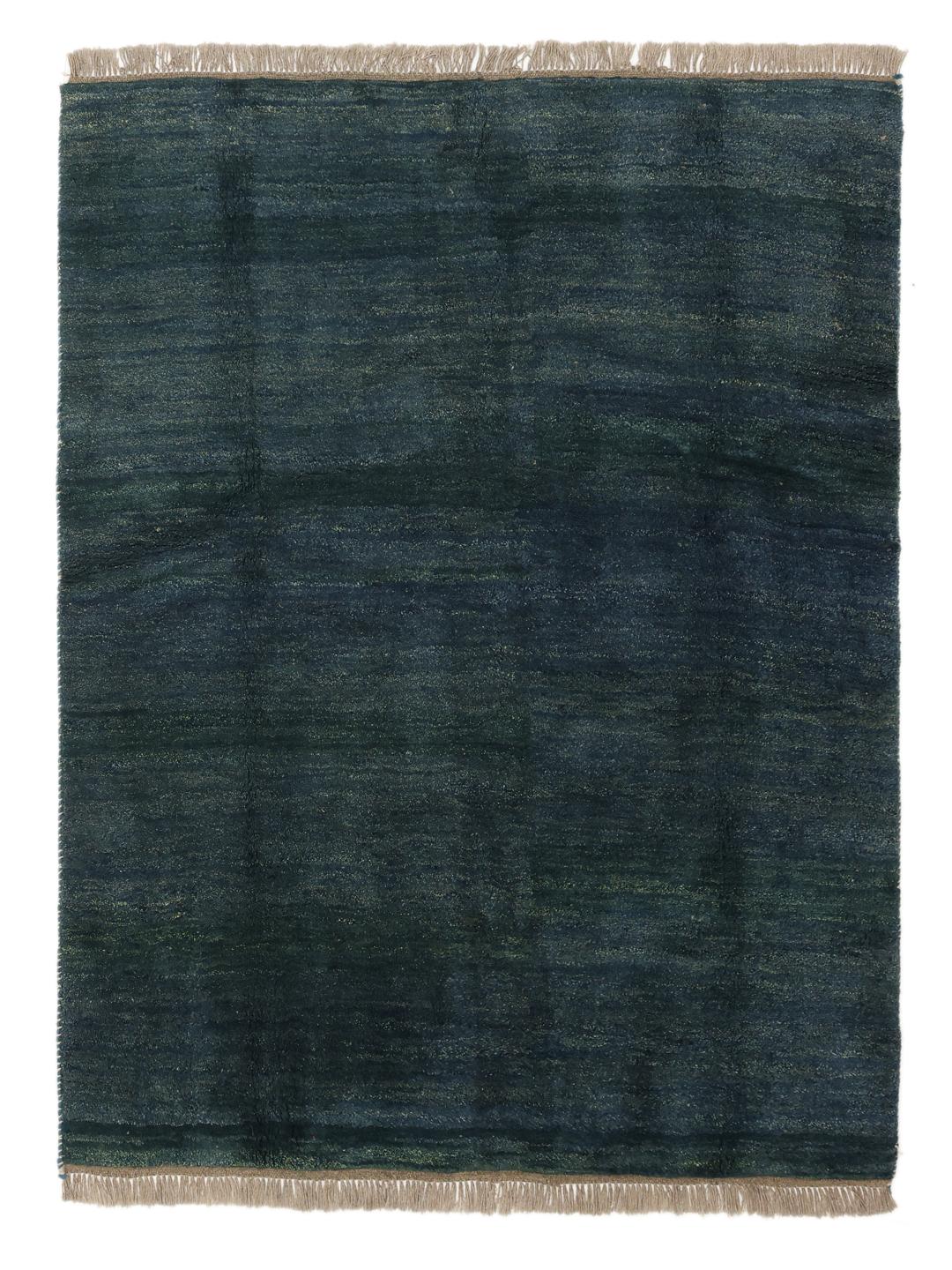 Un tapis Gabbeh Fine noué à la main originaire du Moyen-Orient en laine bleu profond.