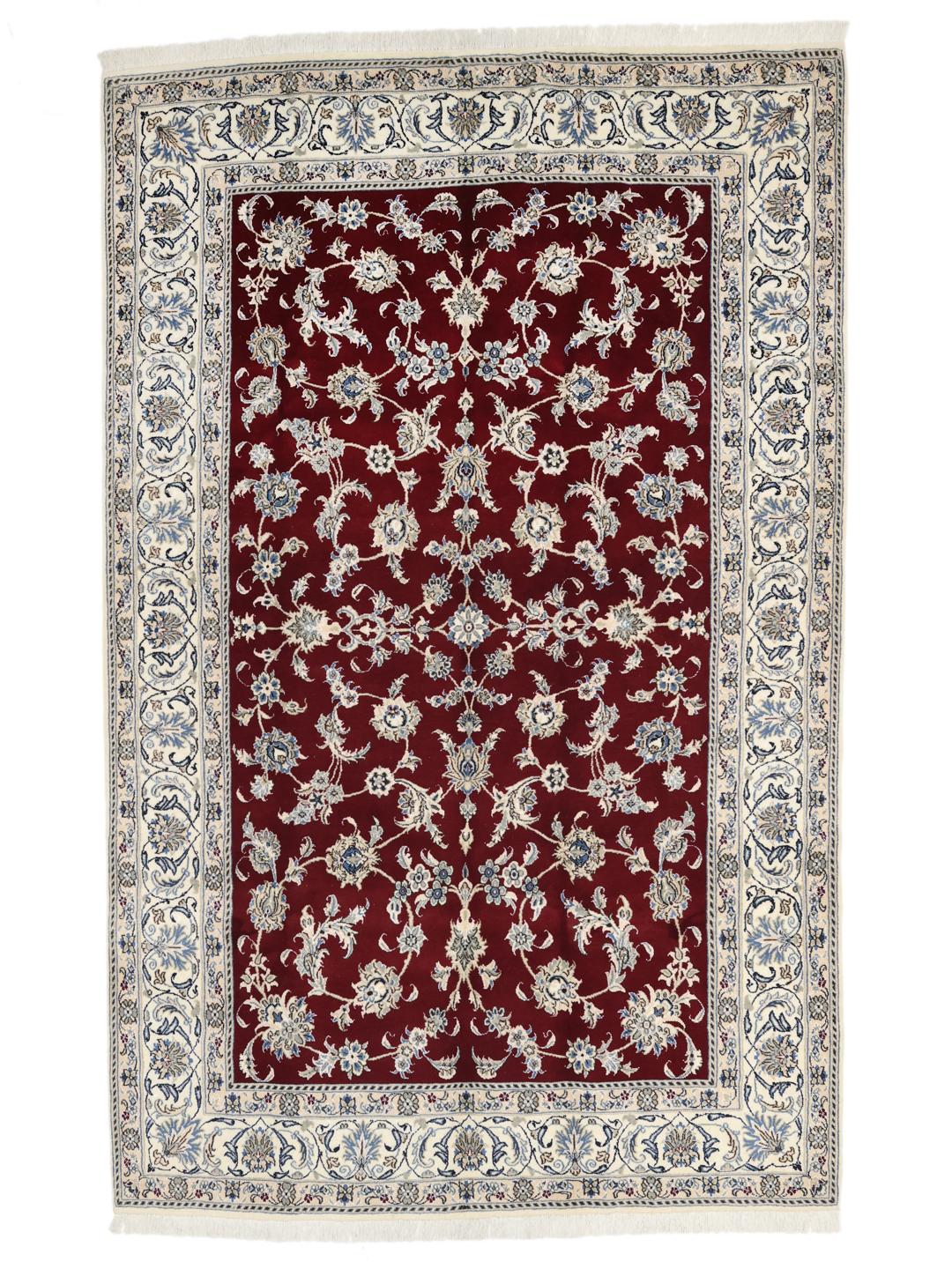 Hand-knotted Nain rug from the Middle East featuring a dark-red floral field and blue border