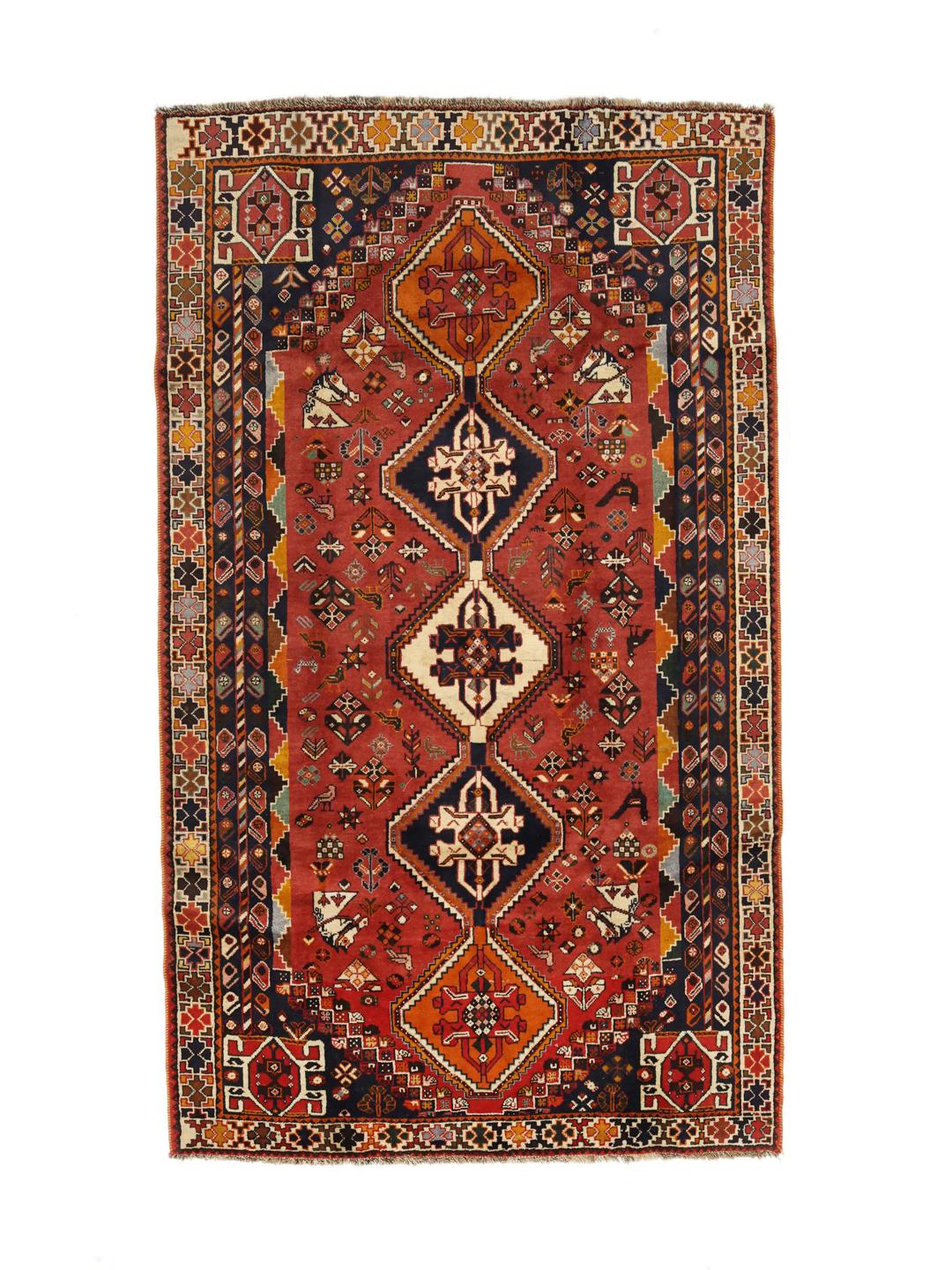 Hand-knotted Shiraz rug from the Middle East in deep red and blue tones