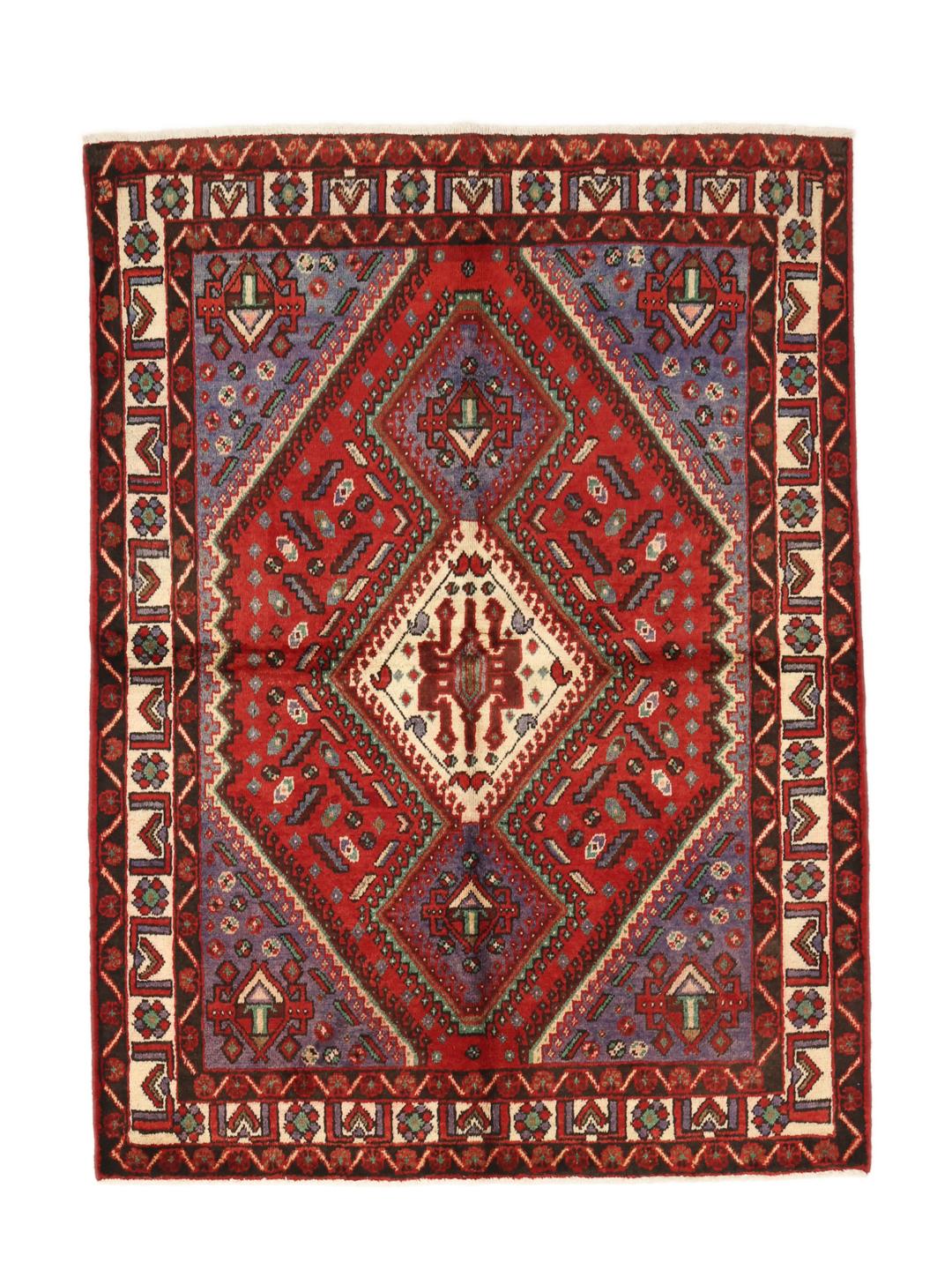 Een handgeknoopt Joshaghan-tapijt uit het Midden-Oosten in tinten rood en blauw.