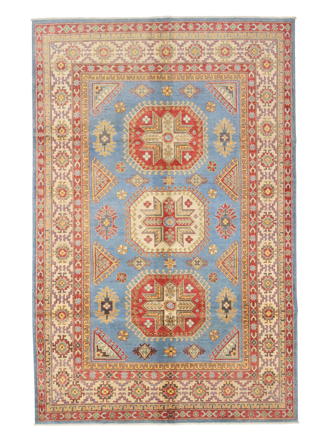 Hand-knotted Kazak rug from Afghanistan with a blue field and geometric patterns.