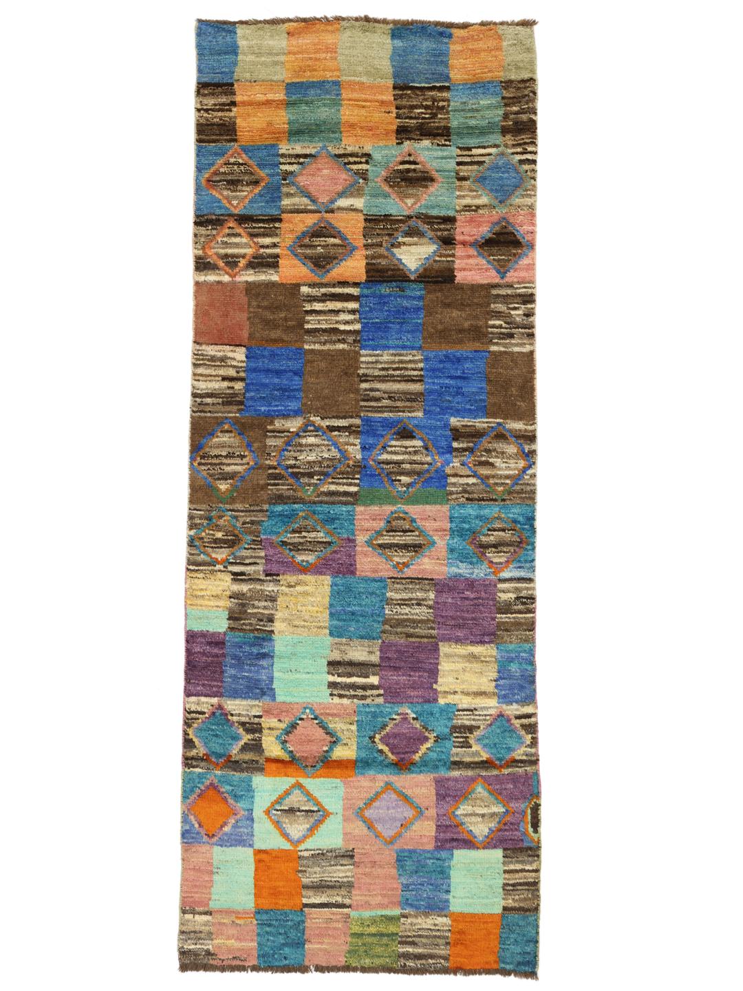 Håndknyttet løber med et farverigt geometrisk patchwork-mønster fra Afghanistan