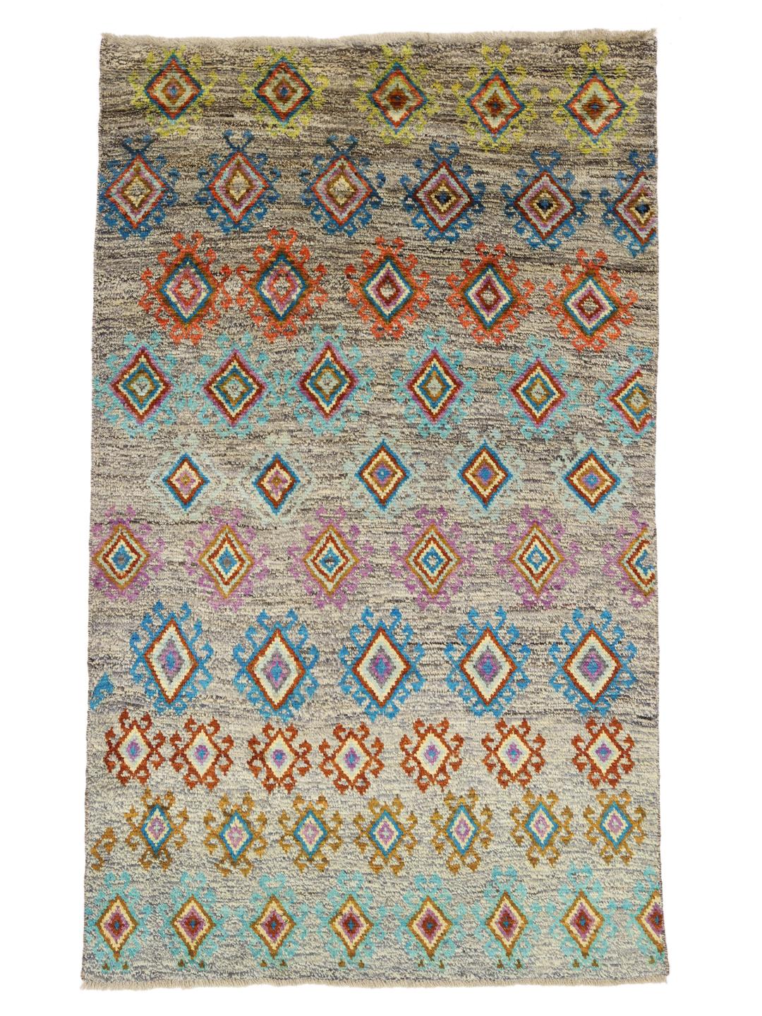 Hand-knotted Afghan rug with colourful geometric patterns on a grey background