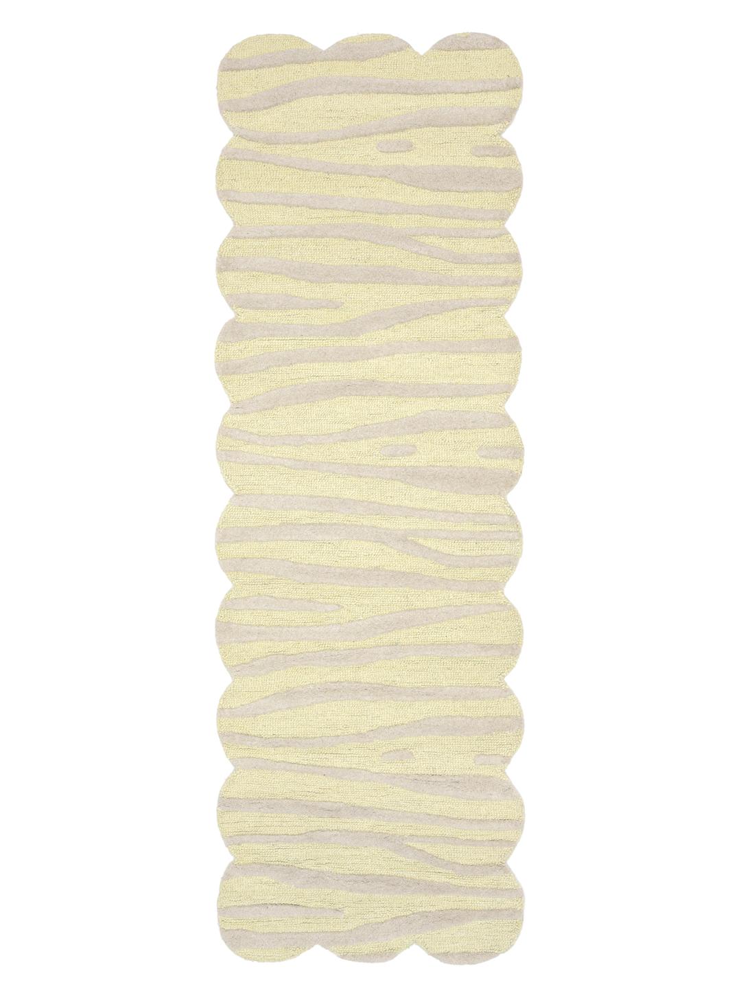 Gele en beige loper met een speels, op zebra's geïnspireerd patroon