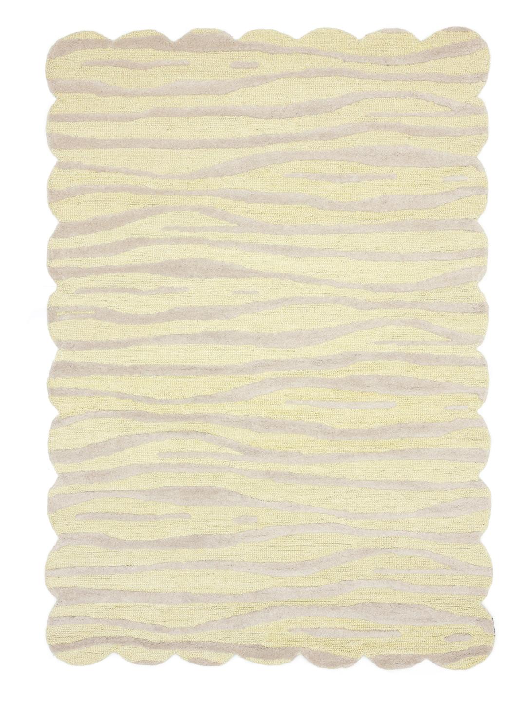 Geel en beige wollen tapijt met een golvend patroon en schulpranden