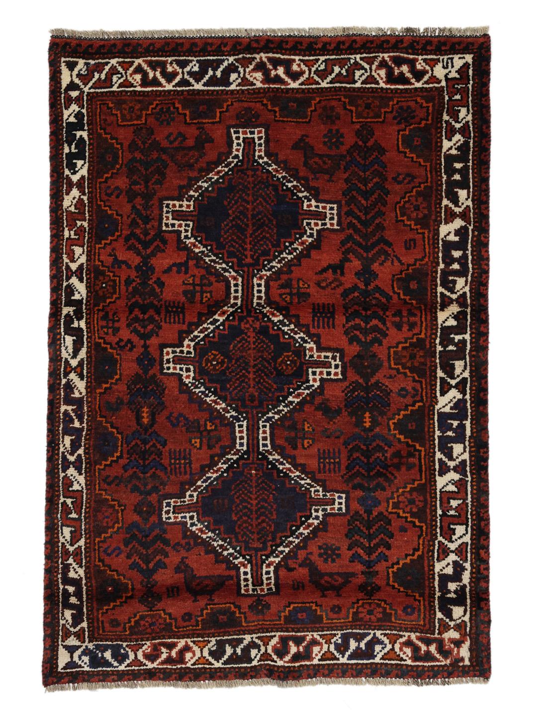 Hand-knotted Shiraz rug from the Middle East in deep red and blue tones