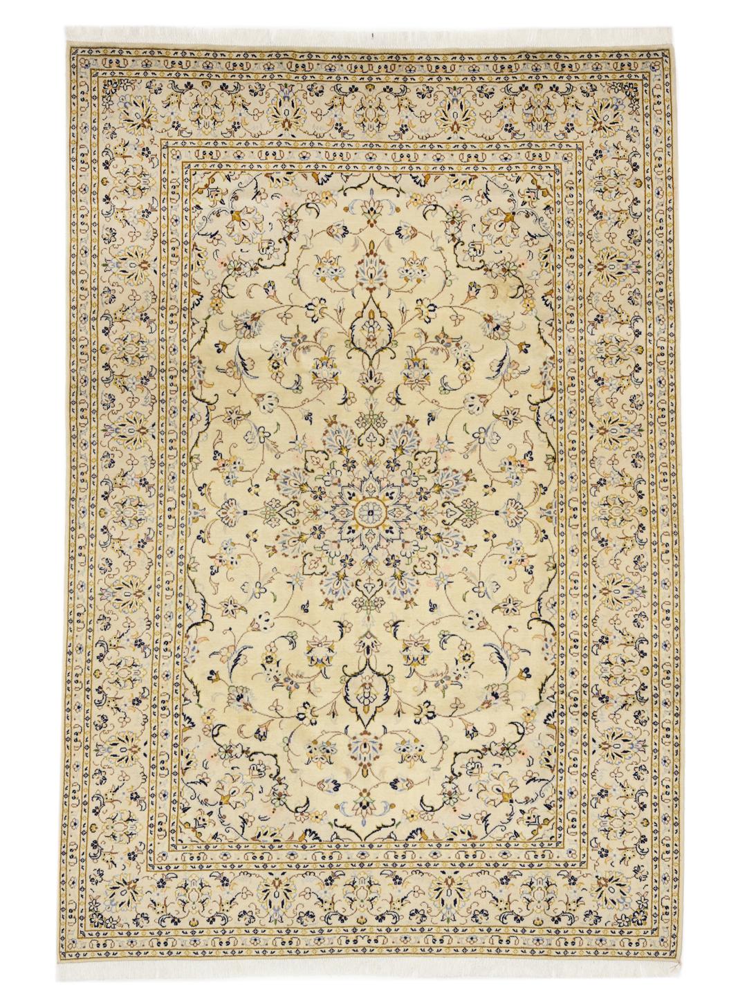 Hand-knotted Keshan rug from the Middle East featuring a beige floral design.