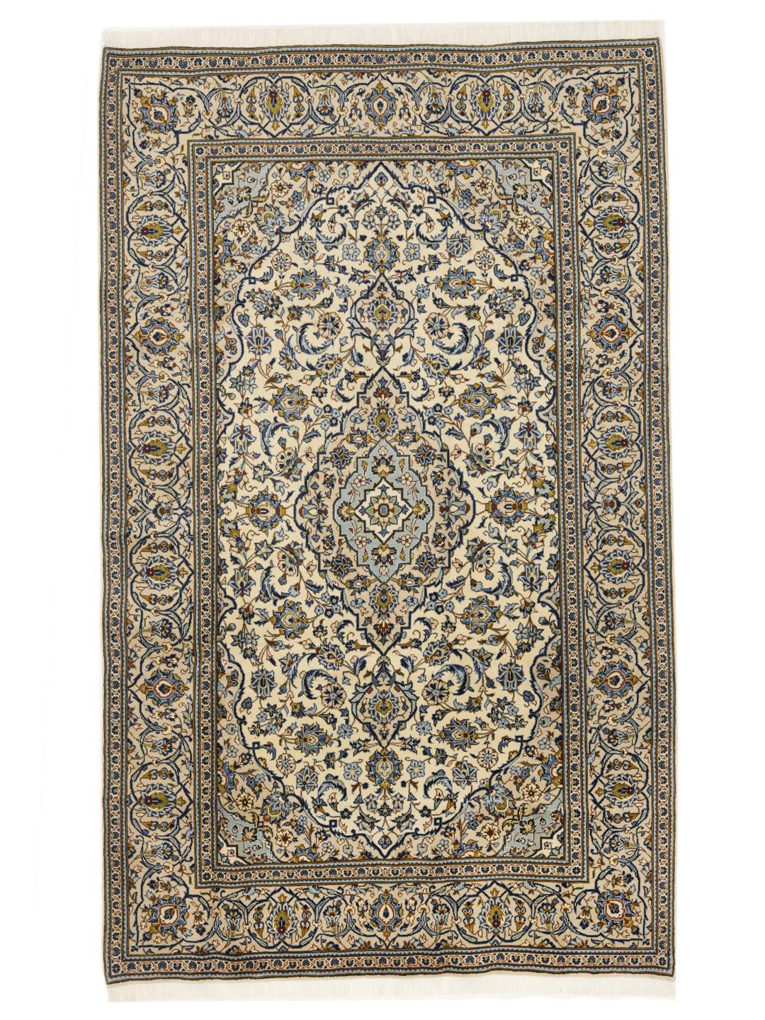 Hand-knotted Keshan rug from the Middle East with a floral pattern in blue and beige.