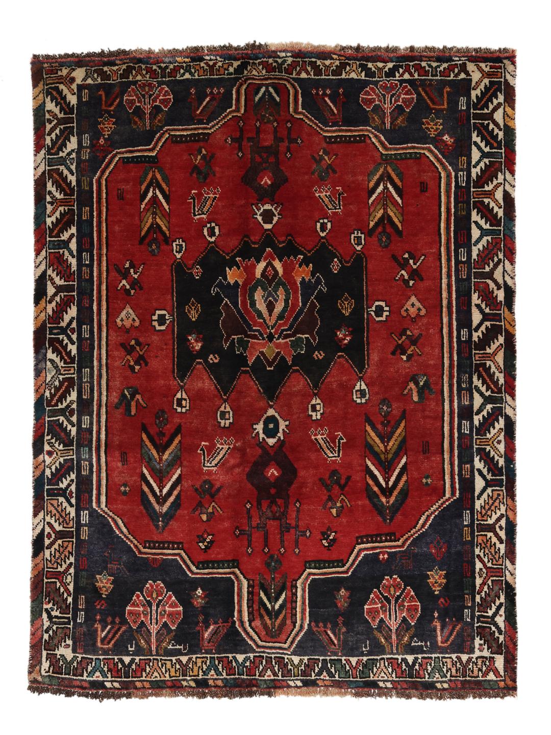Hand-knotted Shiraz rug from the Middle East in deep red and dark blue tones