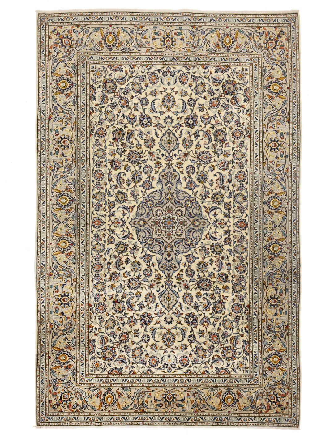 A rectangular hand-knotted Keshan rug from the Middle East in beige tones with floral patterns.