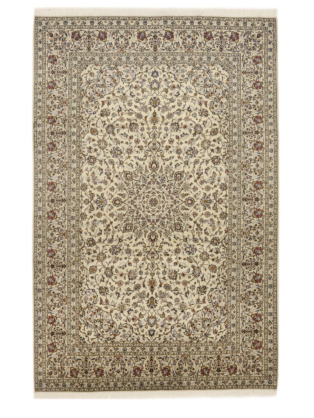 Hand-knotted Keshan rug from the Middle East with a beige field and intricate floral pattern